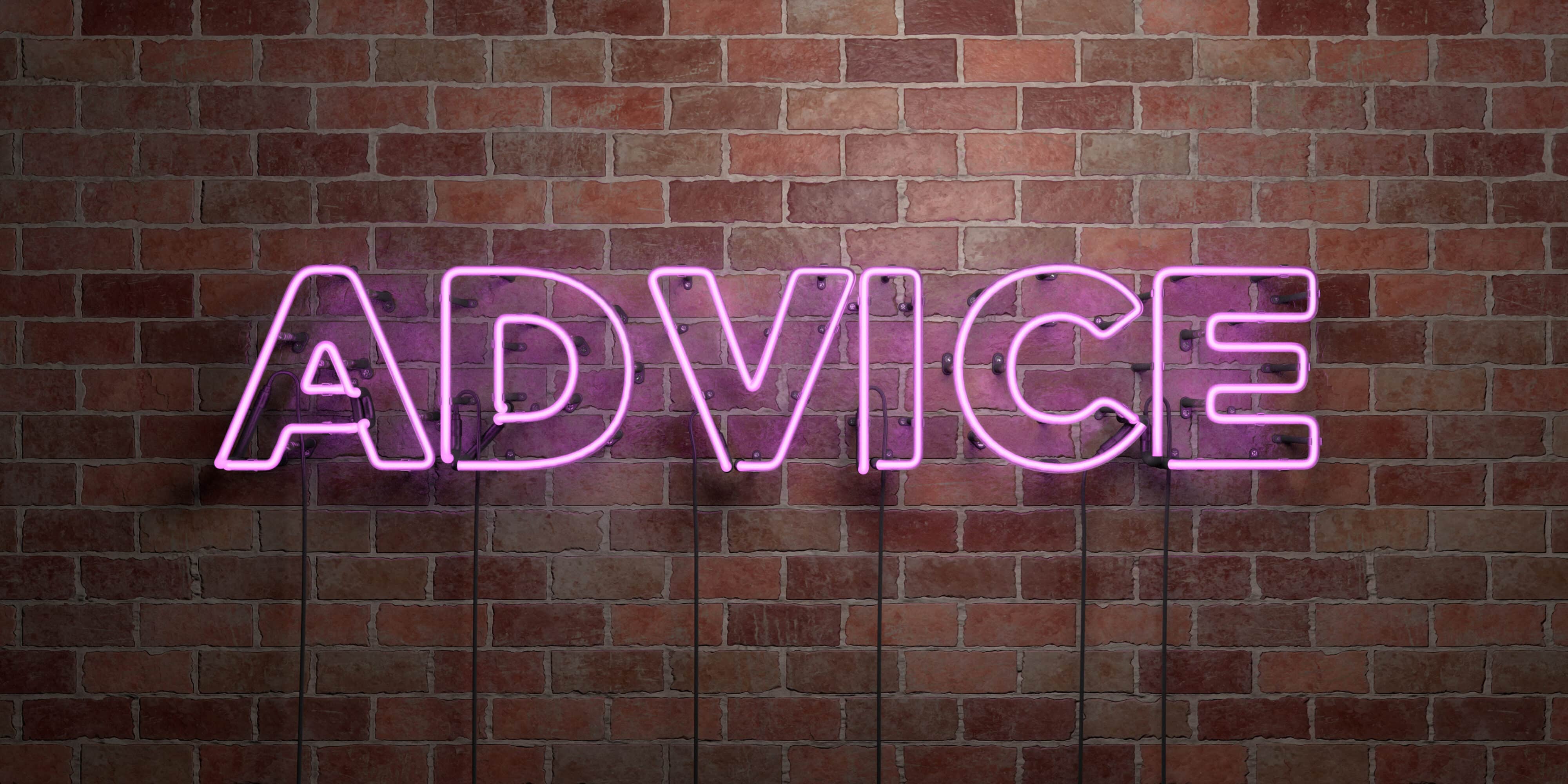 ADVICE fluorescent Neon tube Sign on brickwork